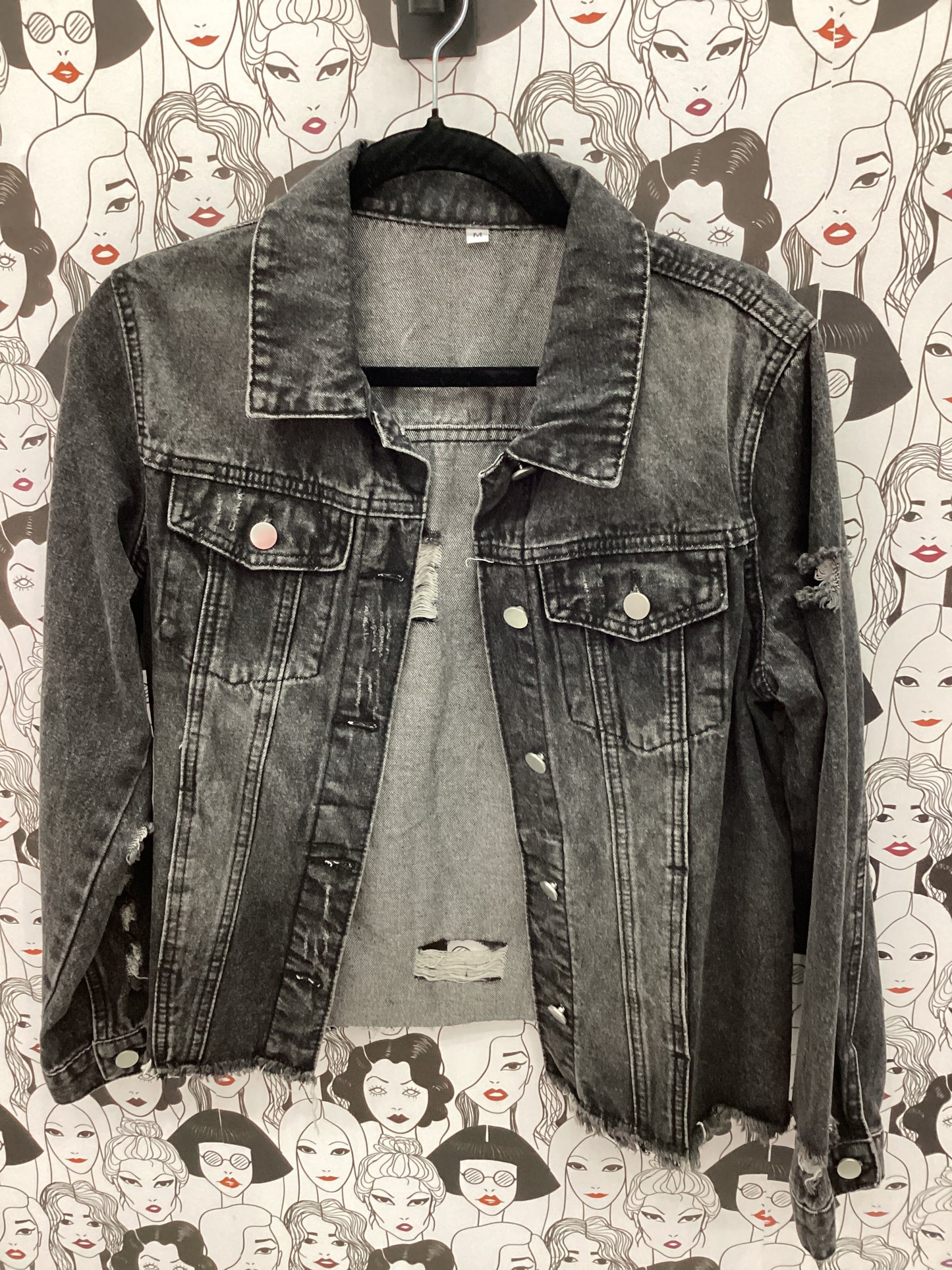 Black, distressed denim jacket