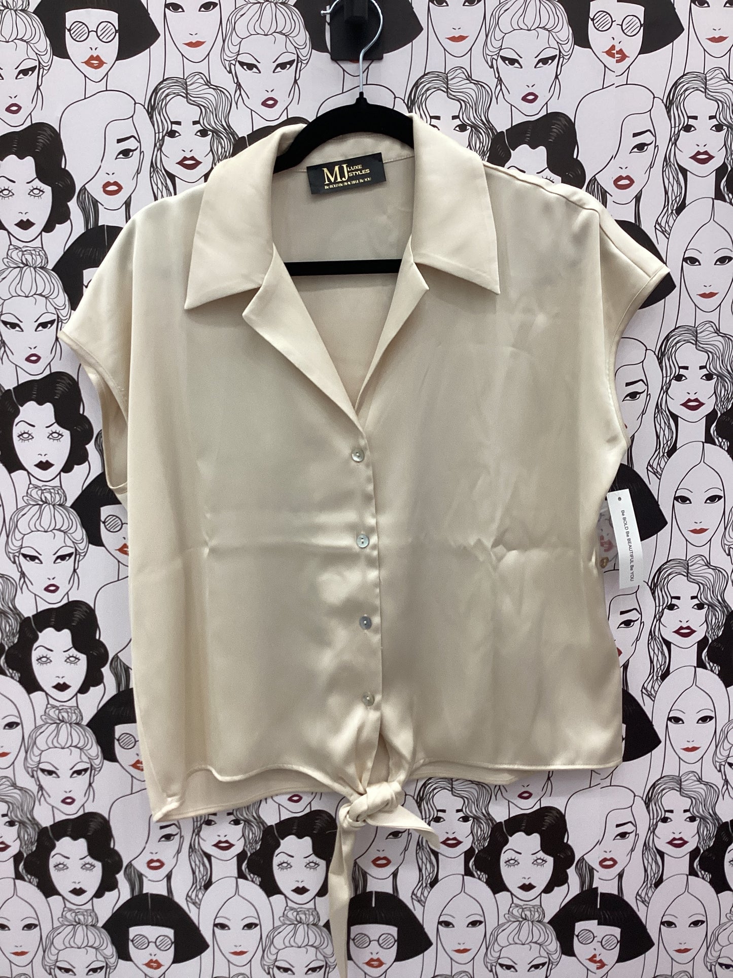 Creamy sleeveless blouse
