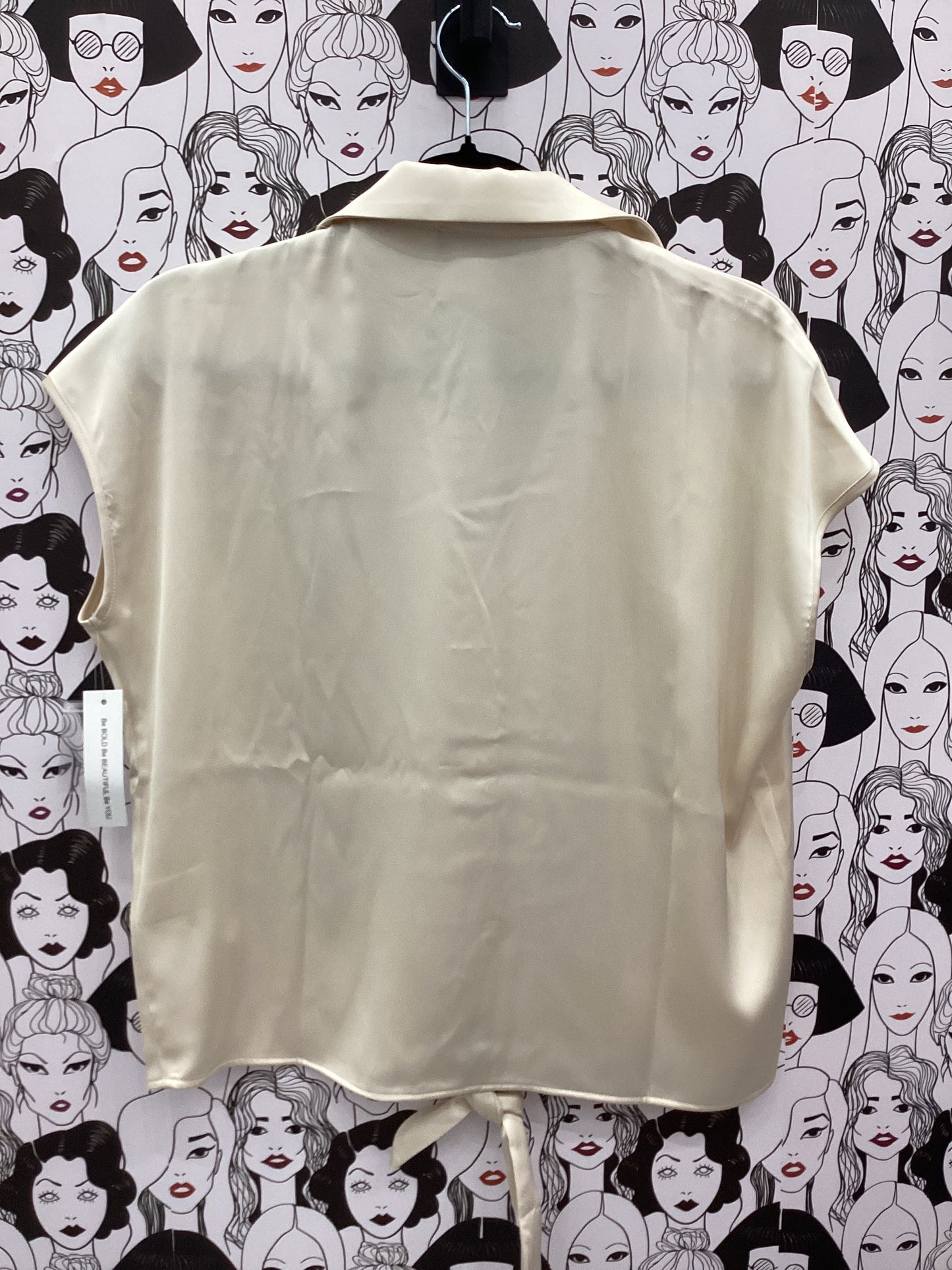 Creamy sleeveless blouse