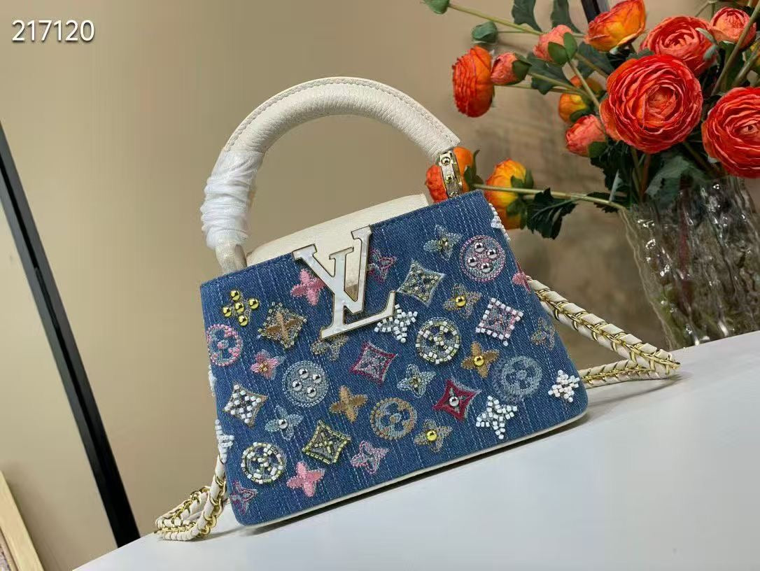 LIMITED EDITION  Louis Vuitton Capucines Mini bag in Monogram denim