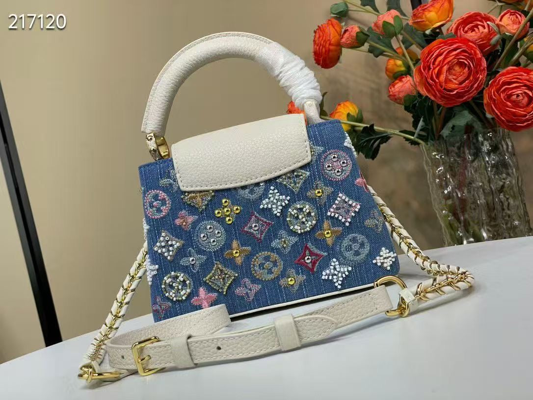 LIMITED EDITION  Louis Vuitton Capucines Mini bag in Monogram denim