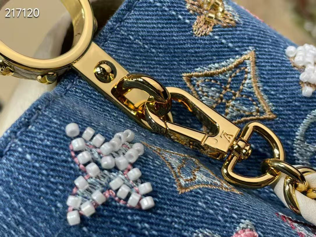 LIMITED EDITION  Louis Vuitton Capucines Mini bag in Monogram denim